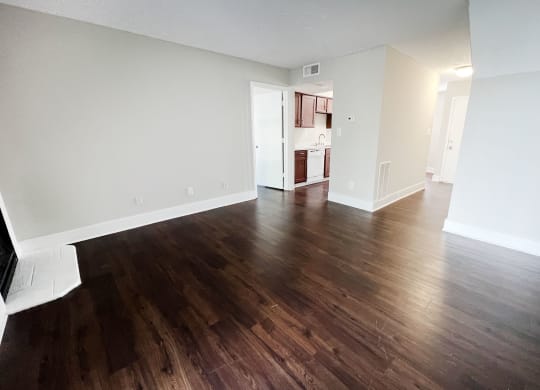 an empty living room with hardwood floors at 450 on Keeneland, Richmond, KY