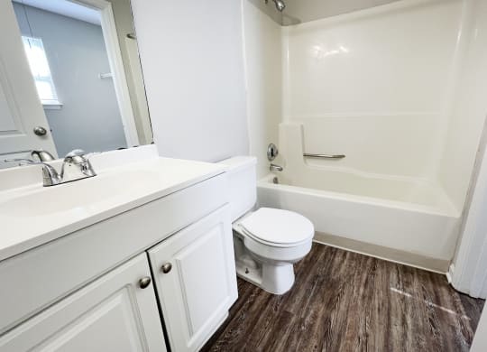 a bathroom with a toilet sink and bathtub at 450 on Keeneland, Richmond, 40475
