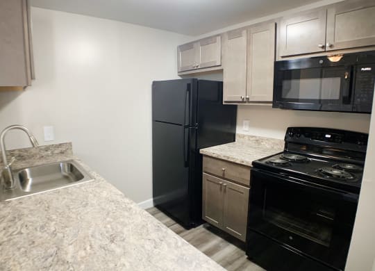 Renovated Kitchen at Woodhills Apartments, West Carrollton, OH, 45449