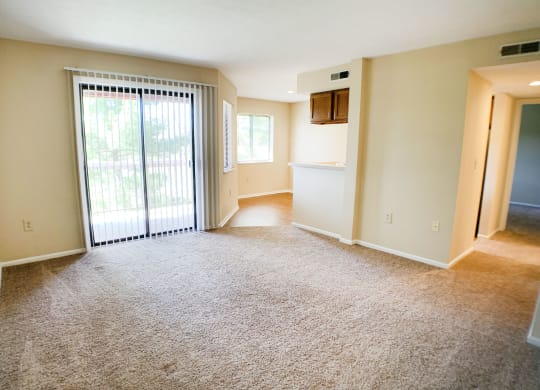Living room with balcony at Deercross Apartments, Ohio, 45236