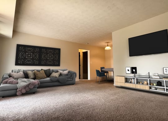 a living room with a couch and a tv at Four Worlds Apartments, Ohio, 45231