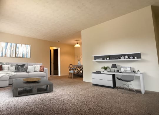 a living room with a couch and a coffee table at Four Worlds Apartments, Cincinnati, OH 45231