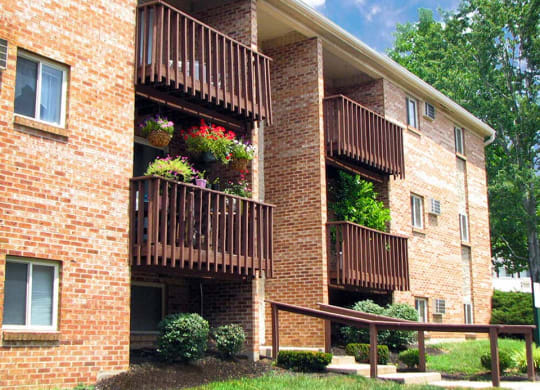 a brick apartment building with balconies at Hunter Ridge Apartments, Cincinnati, Ohio