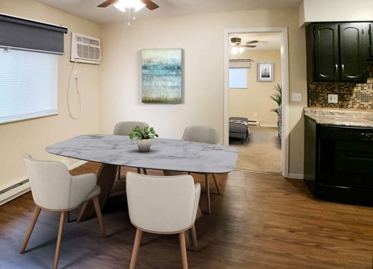 a dining room with a table and chairs at Hunter Ridge Apartments, Cincinnati, OH, 45244