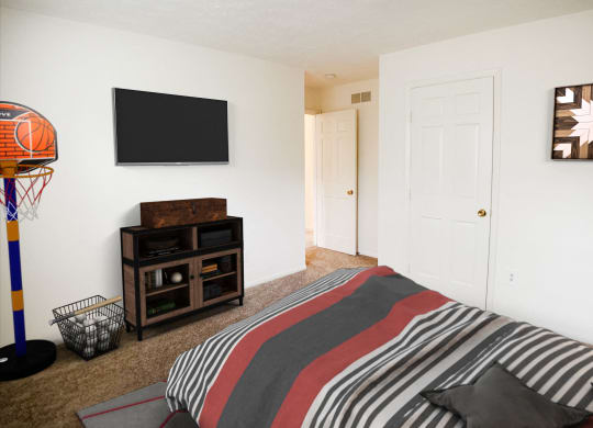 Bedroom With TV  at Revere Village Apartments, Centerville, 45458