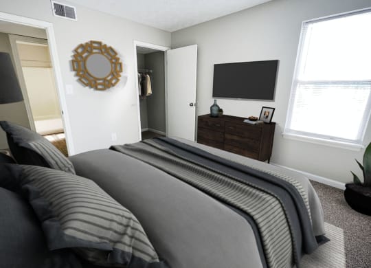 a bedroom with a bed and a dresser at 450 on Keeneland, Richmond