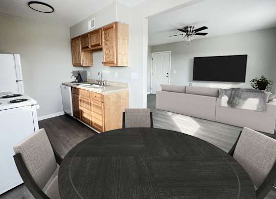 an open kitchen and living room with a dining table and a white stove and refrigerator