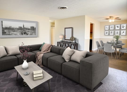 a living room with a couch and a coffee table  at Timber Ridge Apartments, Cincinnati