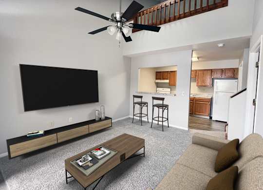 A living room with a couch, a coffee table, and a television.