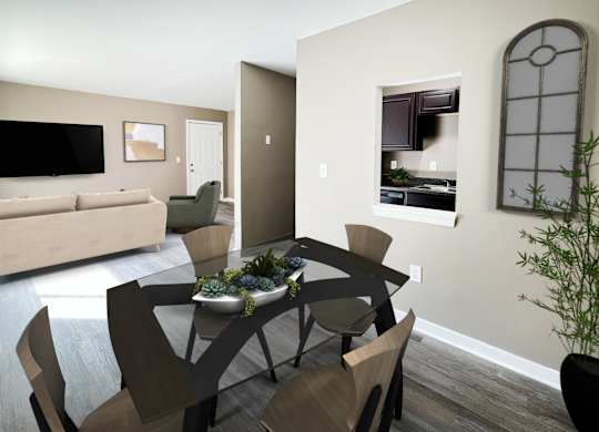 A modern dining room with a wooden table and chairs.