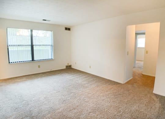 Carpeted Living Area at Four Worlds Apartments, Cincinnati