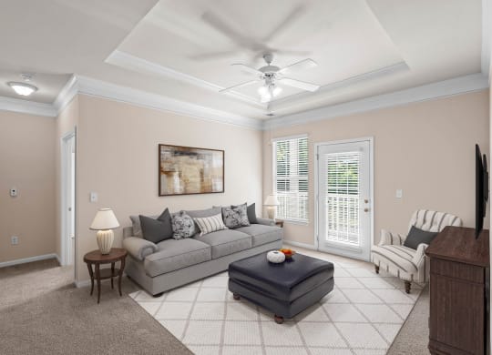 a living room filled with furniture and a ceiling fan at Creekside, Overland Park, Kansas