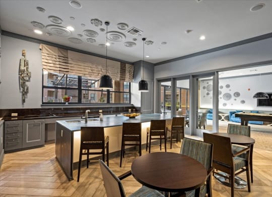 a large kitchen and dining area with a table and chairs