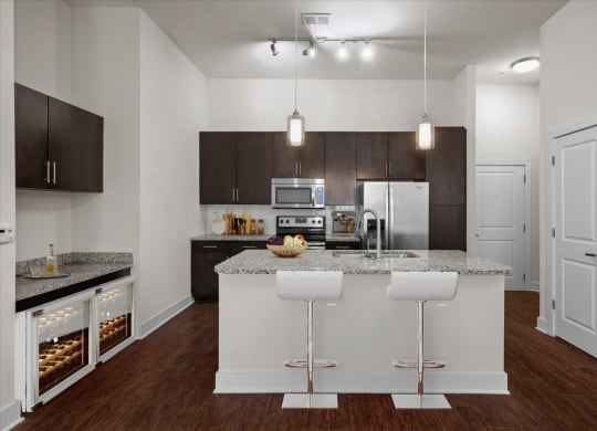 a kitchen with an island and a counter top