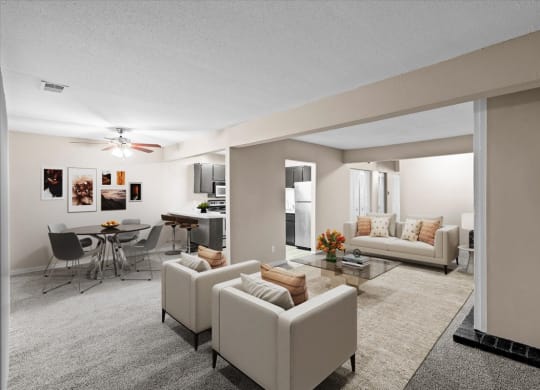 A large open living room with a dining area, ceiling fan, and carpeted floors.