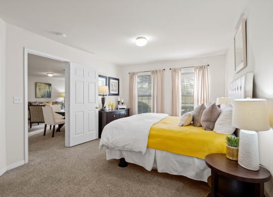 our apartments offer a bedroom with a king sized bedat Stonebriar Woods Apartments, Kansas, 66213