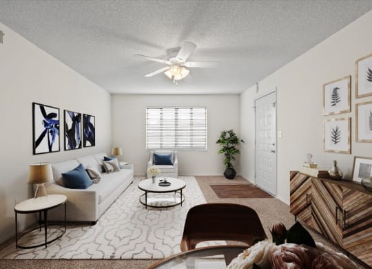 A living room with a window and a ceiling fan.