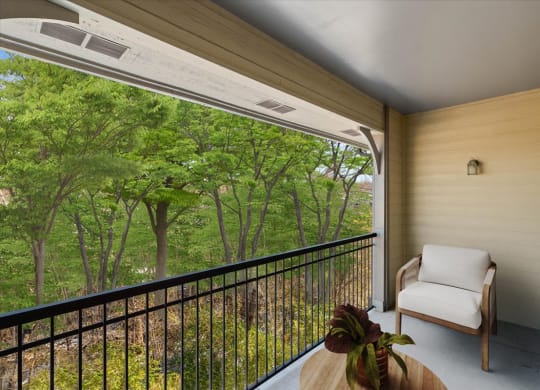 A large private enclosed balcony with a safety railing.