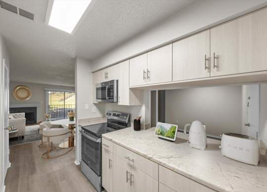 A kitchen with white appliances and cabinets.