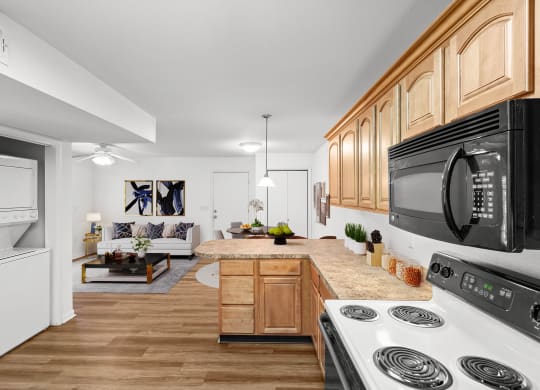 a kitchen and living room in a 555 waverly unit