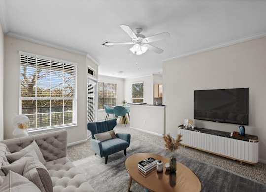 Living Room With TV at Crowne Chase Apartment Homes, Overland Park, KS, 66210