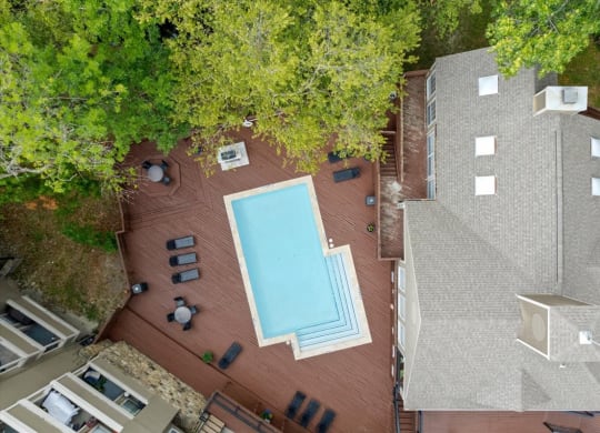 arial view of a house with a swimming pool at Creekview Apartment Homes, Texas