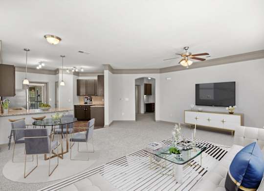 a living room with a couch and a table at Stonepost Crossing Apartments, Overland Park, Kansas