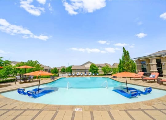 the swimming pool at the apartments for rent