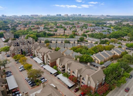 an aerial view of a neighborhood with houses and trees at Creekview Apartment Homes, Dallas, Texas