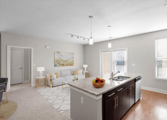 a kitchen and living room with a counter top