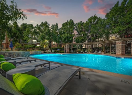 A beautiful swimming pool with lounge seating.