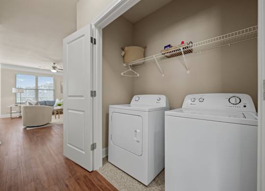 A laundry room with a washer and dryer.