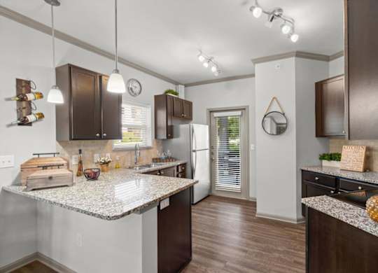 our apartments offer a kitchen at Stonepost Crossing Apartments, Overland Park, Kansas