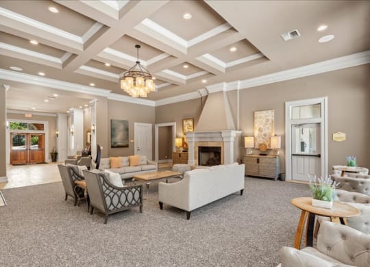 A large clubhouse with an event space and fireplace.