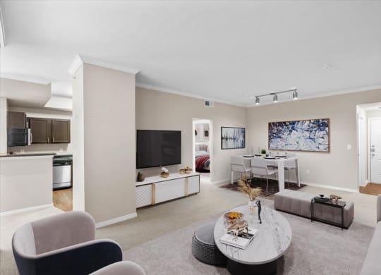 a living room with a couch and a table at The Clairborne Apartment Homes, Grand Prairie, TX, 75050