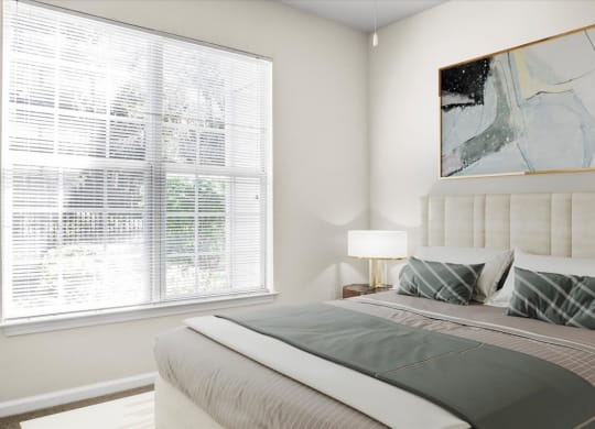 a bedroom with a bed and a large window