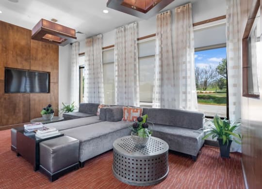 a living room with a couch and a table