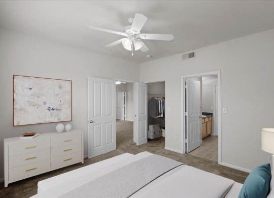 a bedroom with a white bed and a ceiling fan at Stonepost Lakeside, Olathe, 66062