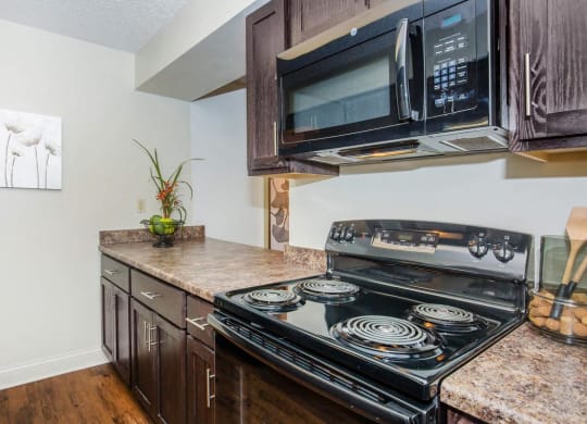 Kitchen cabinets and appliancesat Cloverset Valley Apartments, Missouri, 64114
