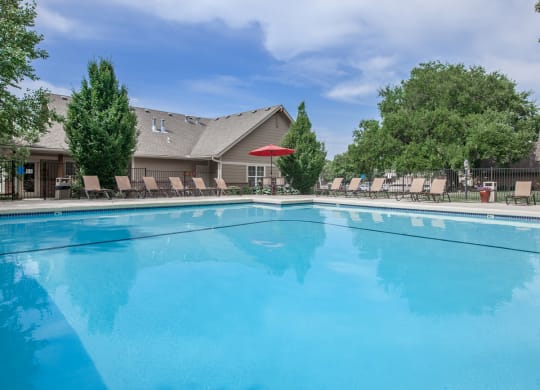Pool view with buildingat Preston Court Apartments, Kansas, 66212