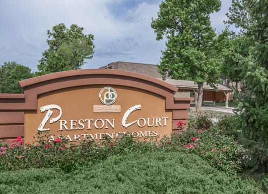 A monument sign reading "Preston Court Apartment Homes."