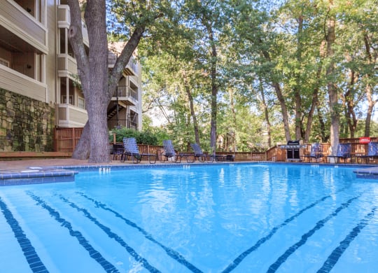 pool with trees  at Creekview Apartment Homes, Dallas, 75254