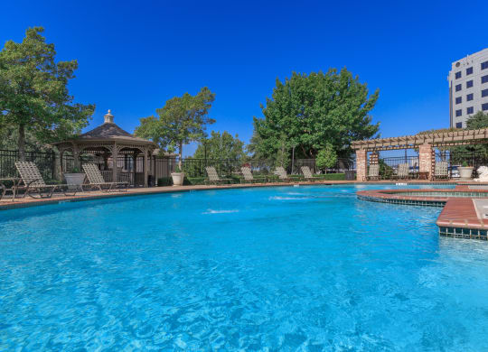 Swimming pool view at The Clairborne Apartment Homes, Texas