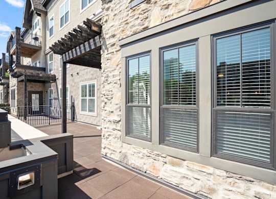 Outdoor area with windows at The Mirabelle Luxury Apartments in Kansas City, Missouri