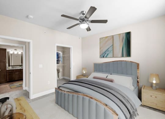 a bedroom with a bed and a ceiling fan