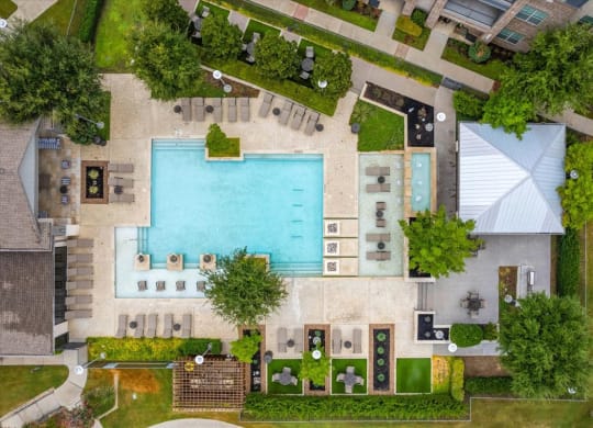 arial view of a house with a swimming pool