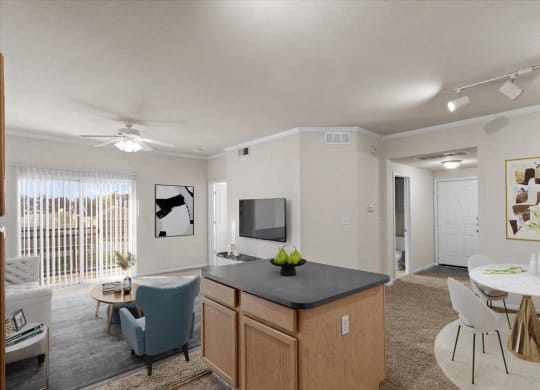 our apartments offer a living room and dining room with a tv at Stonepost Lakeside, Olathe, KS