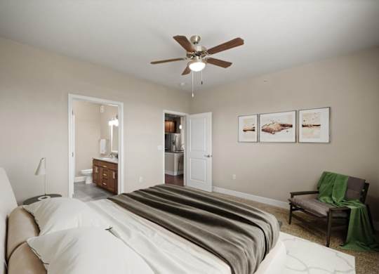 Bedroom with ceiling fan at The Residences at Bluhawk Apartments, Overland Park, KS