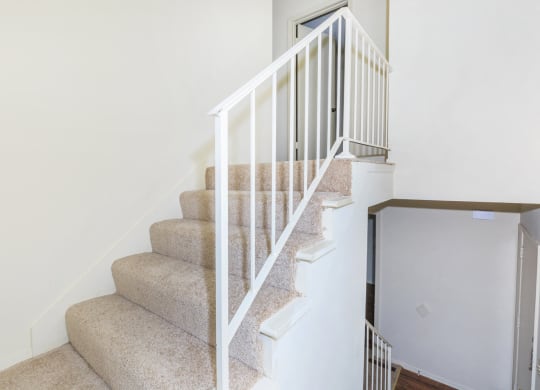 Loft Staircases at Louisburg Square Apartments & Townhomes, Kansas, 66212