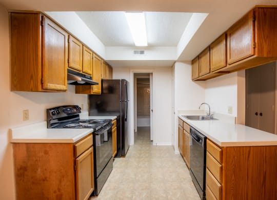 Modern Kitchen With Custom Cabinet at Waterford Place Apartments & Townhomes, Overland Park, Kansas